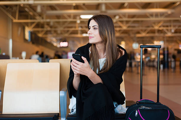 istock Airport Young female passenger 494215974