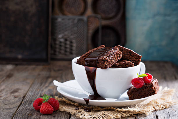 istock Brownies in stacked coffee cups with chocolate sauce 494220482