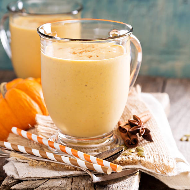 istock Healthy pumpkin smoothie in big mugs 494221734
