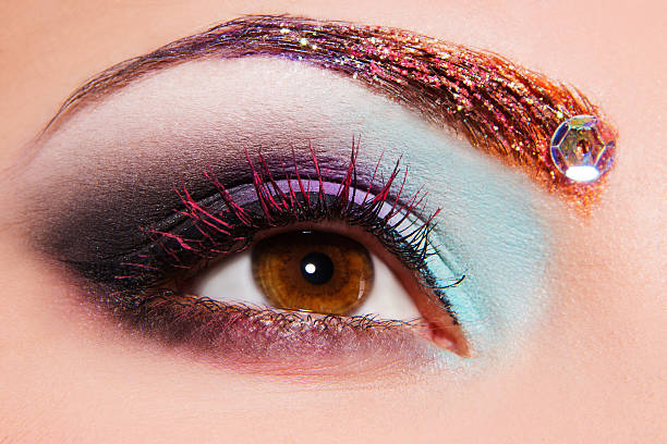 istock Close-up of woman's eye with creative make-up 494224426