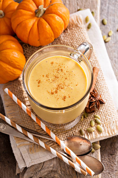istock Healthy pumpkin smoothie in big mugs 494225472