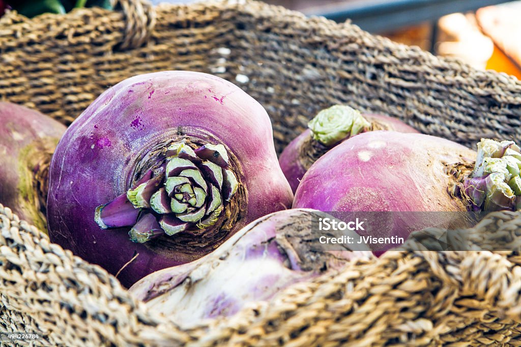 Rutabaga or Turnip at Organic Famers Market in Basket A rutabaga or turnip sitting in a basket at an organic fall harvest market Rutabaga Stock Photo