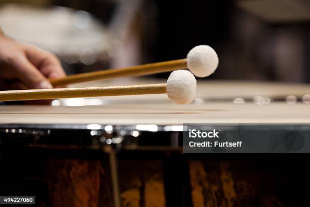 Drum Sticks Hitting The Timpani Stock Photo - Download Image Now - Percussion Instrument, Timpani, Kettledrum