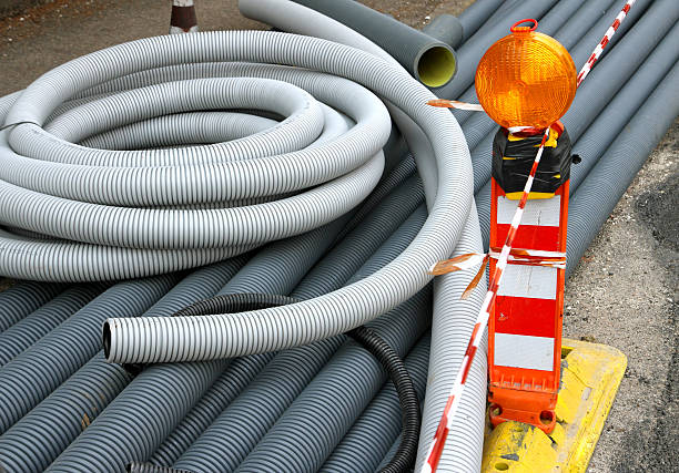 istock signal light and plastic pipes for laying optical fiber 494234595