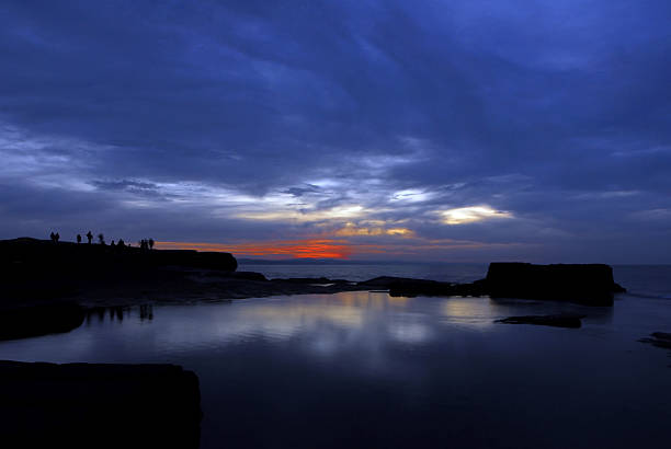 zachód słońca na plaży – zdjęcie
