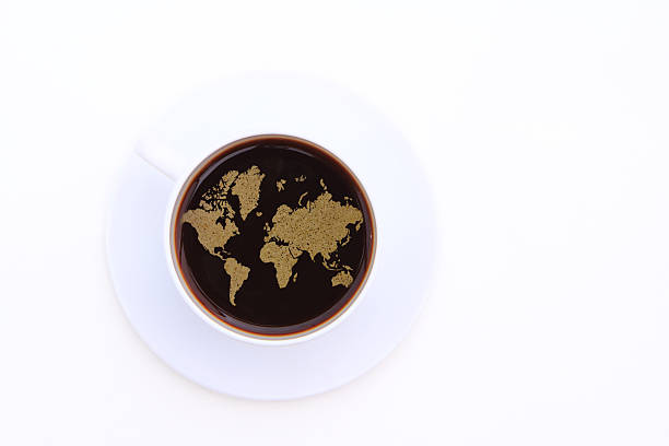 istock Cup of Coffee with foam transformed into a world map 494237397