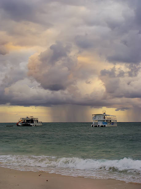 Rainstorm in a sea at sunrise