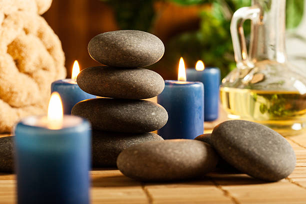 istock Spa still life with hot stones and candles 494241849