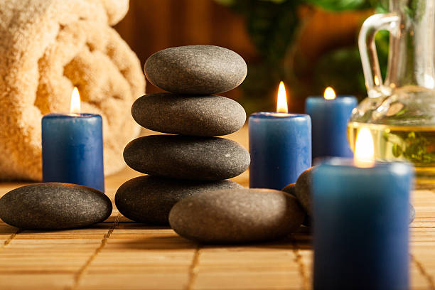 istock Spa still life with hot stones and candles 494241853
