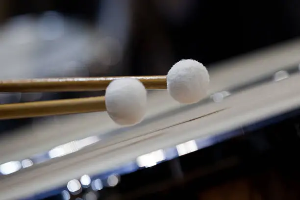 Photo of Drum sticks hitting the timpani