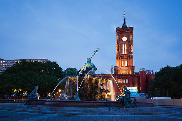 Neptune Fountain in Berlin Berlin, Germany - May 10, 2013: Evening view of the Neptune Fountain near Rotes Rathaus and Alexanderplatz in Berlin at spring time berlino stock pictures, royalty-free photos & images