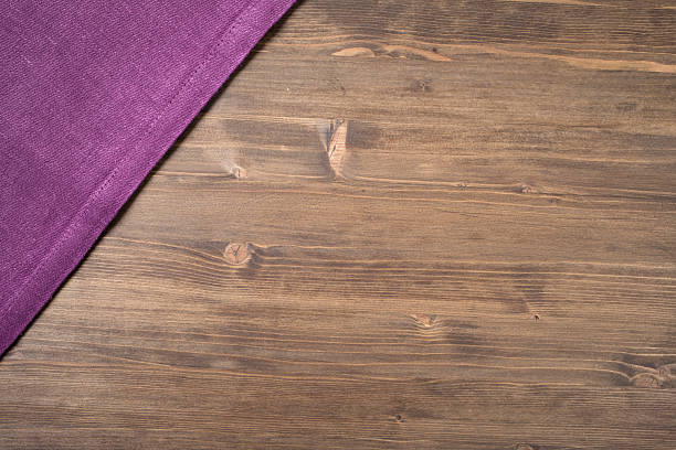 istock Purple  napkin from left top corner wooden table 494245906