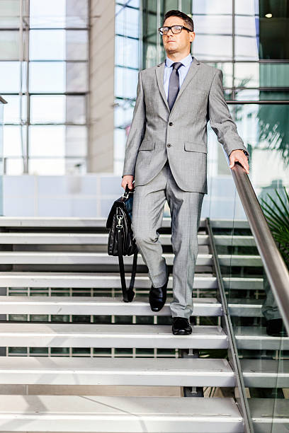 istock Businessman arriving to a modern office building. 494246126