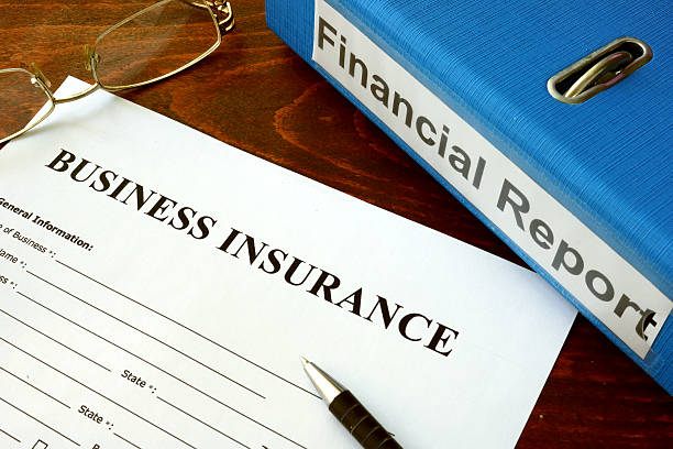 istock Business insurance form and dollars on the table. 494246648