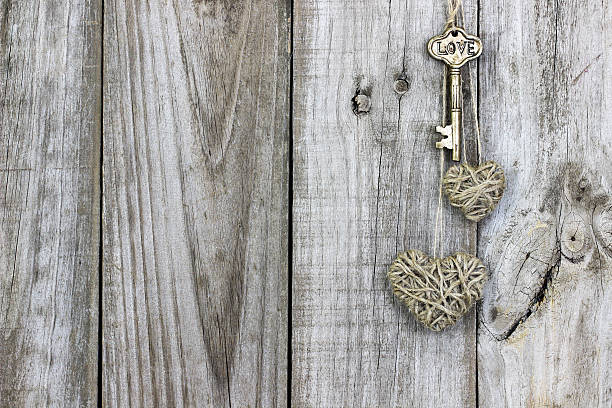 istock Skeleton key and rope hearts hanging on door 494249202