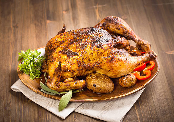 istock Grilled chicken on wooden plate 494249776