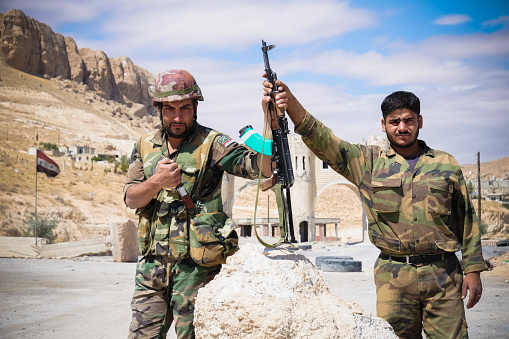 Ma'loula, Syria - September 19, 2013: Soldiers of the Syrian National Army at the gates of the city Ma'loula. Ma'loula became a place of fighting between Assad forces and the rebels.