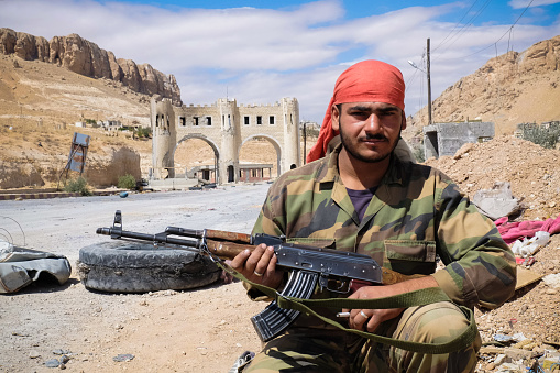 Ma'loula, Syria - September 19, 2013: The soldier of the Syrian National Army at the gates of the city Ma'loula. Ma'loula became a place of fighting between Assad forces and the rebels.