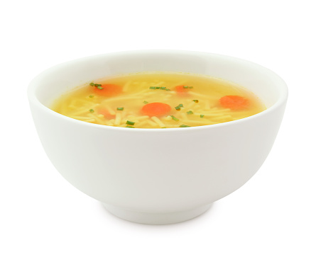 Chicken Noodles Soup Bowl with carrots and chives isolated on white (excluding the shadow)