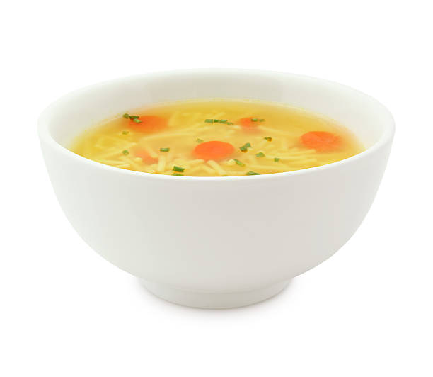 Chicken Noodles Soup Chicken Noodles Soup Bowl with carrots and chives isolated on white (excluding the shadow) bowl of soup stock pictures, royalty-free photos & images