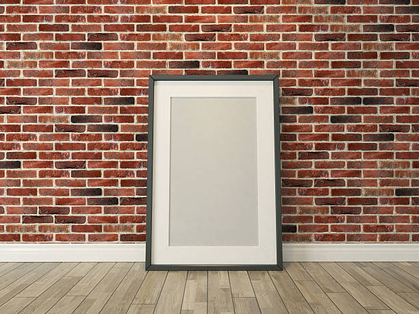istock picture frame on the brick wall and wood floor 494250240