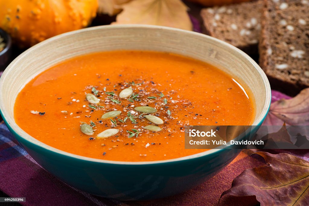 pumpkin soup in a bowl, closeup pumpkin soup in a bowl on table 2015 Stock Photo