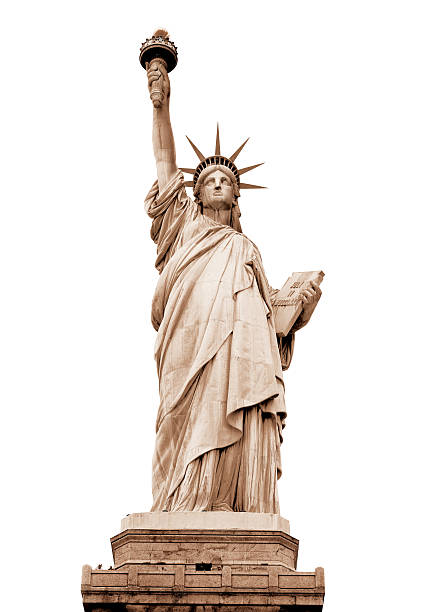 The statue of liberty in New York on a sunny day.