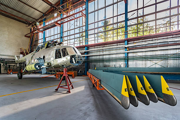 istock Helicopter repair stand in the hangar 494254694