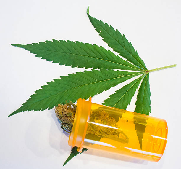 Marijuana and Prescription Bottle stock photo