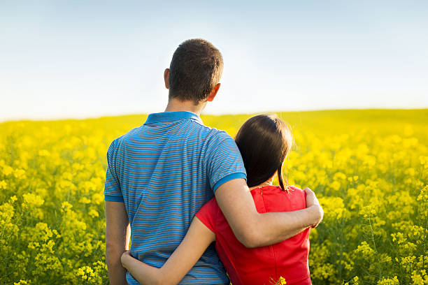 istock Couple in love in field 494258511