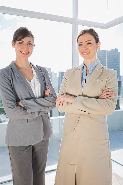 istock Confident businesswomen smiling 494260401