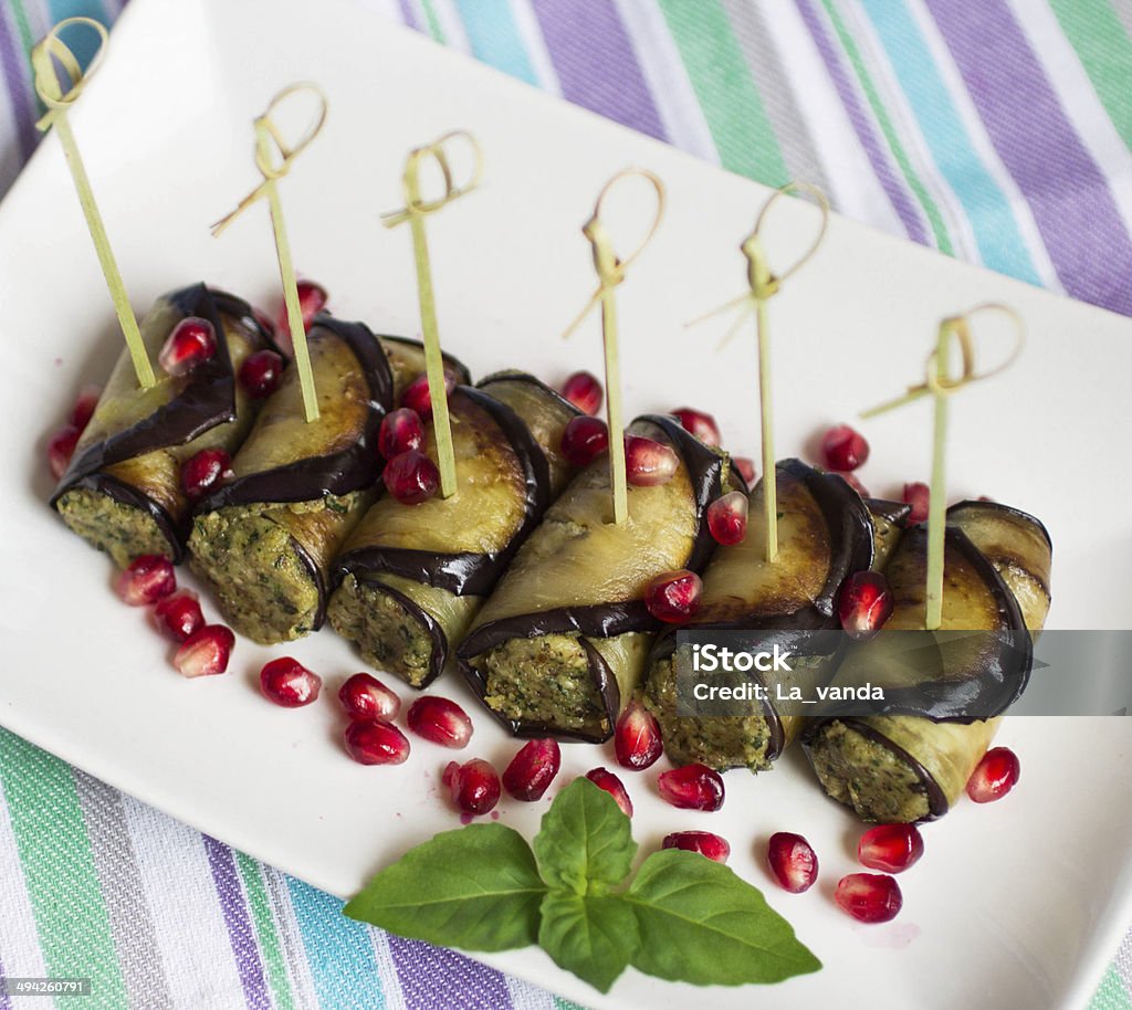 rolls of eggplant with nuts Appetizer Stock Photo