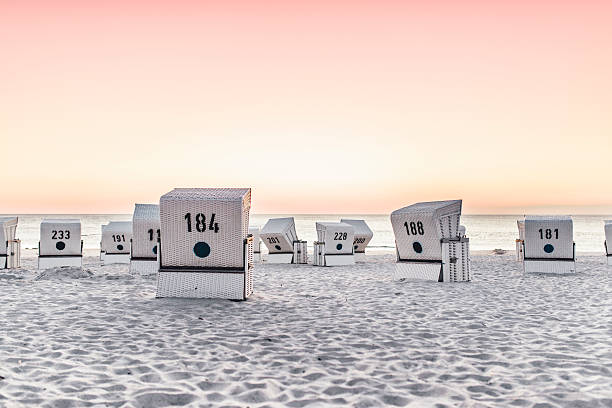 Beach - chair on the island Sylt on sunset. Germany. stock photo