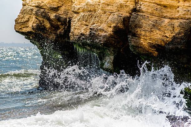 stormy sea and cliff stock photo