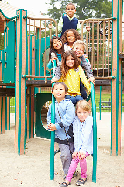 istock Young Children Sitting On Climbing Frame In Playground 494262367