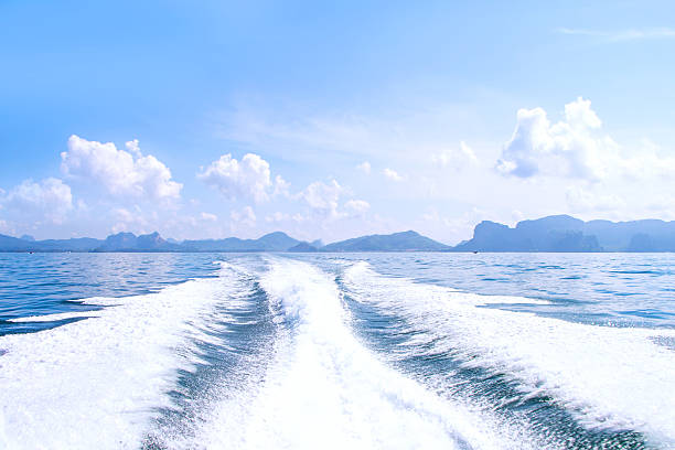 istock Boat wake prop wash on blue ocean 494262483