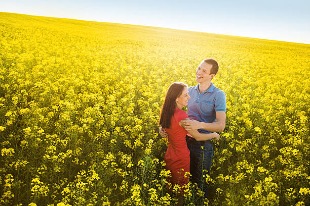 istock Couple in love in field 494264181