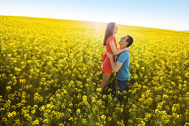 istock Couple in love in field 494264333