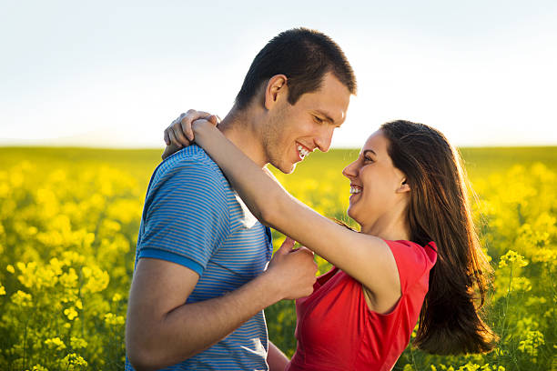 istock Couple in love in field 494264441