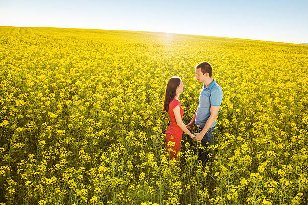 istock Couple in love in field 494275981