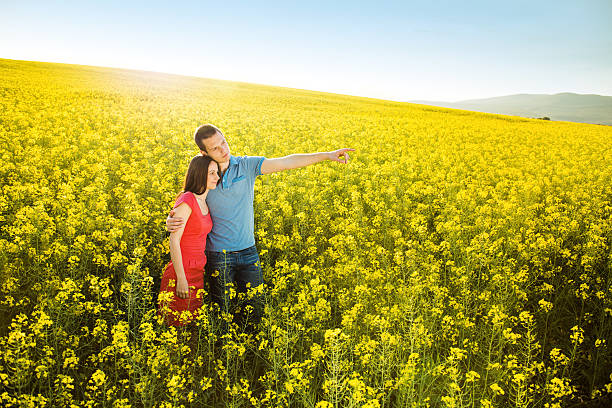 istock Couple in love in field 494275995
