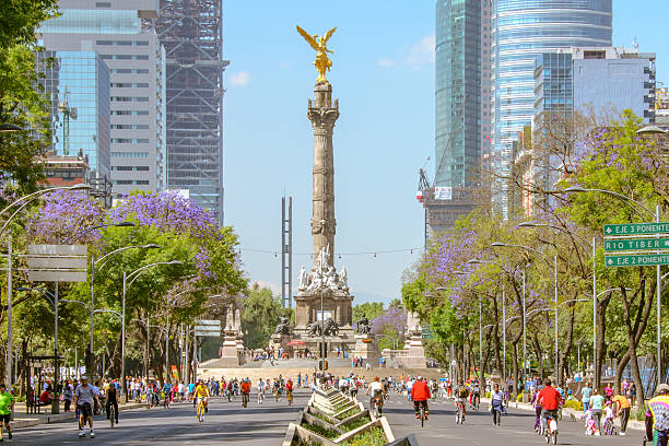 Mexico City, Mexico - March 02, 2014: Paseo de la Reforma closed to cars for the exclusive use of cyclists, joggers and walkers in Mexico City.