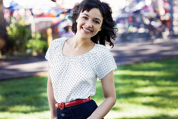 istock Cute Mixed Brunette Smilng In White Blouse 494279154