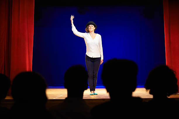 People watching actress on theater stage during play Arts and entertainment in theatre with actress on stage acting in play for audience stage actress stock pictures, royalty-free photos & images
