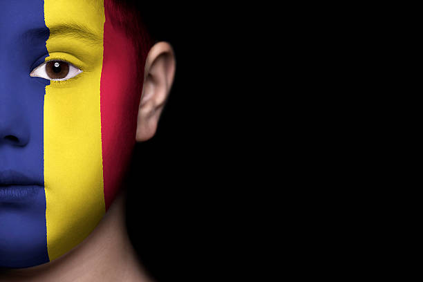 istock Human face painted with flag of Chad 494279993