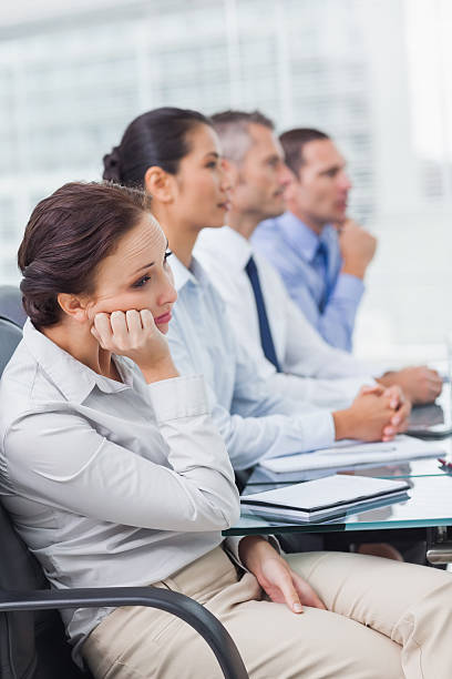 istock Bored businesswoman attending presentation 494281815