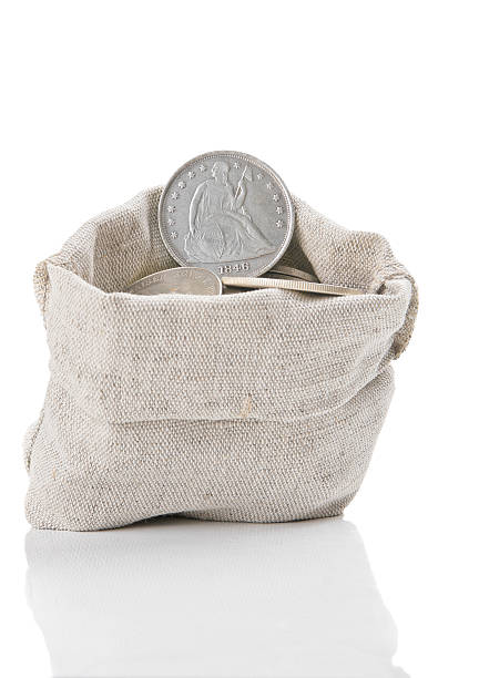 istock Old silver coins in bag 494284226