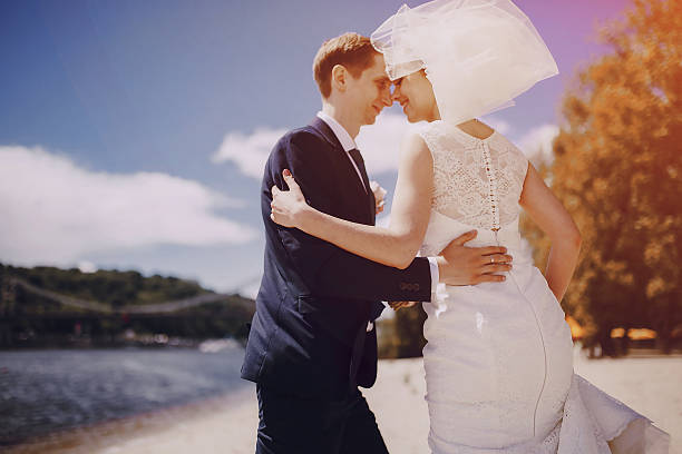 istock couple on the lake beach 494287588
