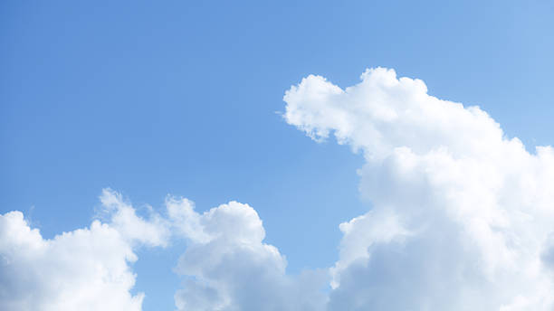 istock Moving and growing cumulus clouds 494288324