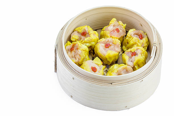 istock Shrimp dumplings in a bamboo steamer 494290164